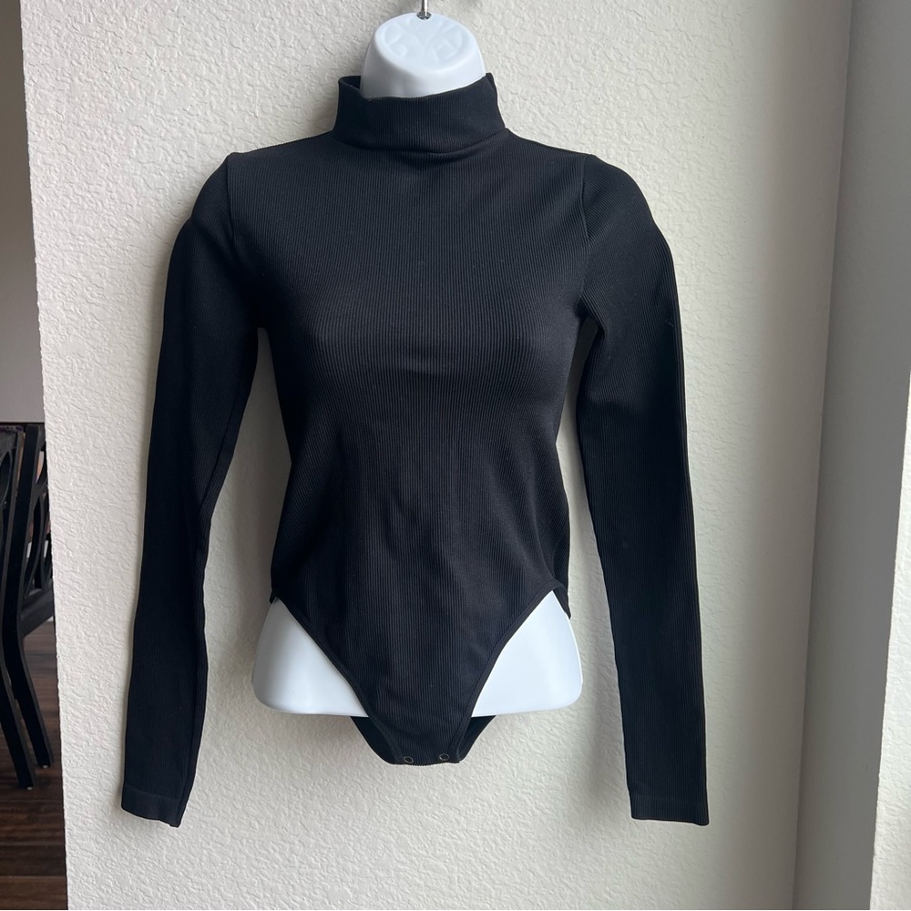 Black turtleneck bodysuit